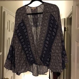 Shirt with bell sleeves